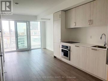 Toronto (Church-Yonge Corridor) condo for rent - A kitchen with white cabinets and a stainless steel sink.