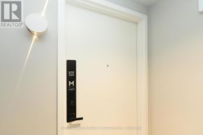 Mississauga (City Centre) condo for rent - A door with a black handle and a white wall.