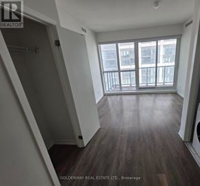 Toronto (Niagara) condo for rent - A laundry room with a washer and dryer in it.