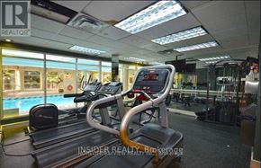 Toronto (Willowdale West) condo for rent - A gym with treadmills and a pool in the background.