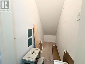 Mississauga (Cooksville) townhouse for rent - A room with a white wall and a wooden plank on the floor.