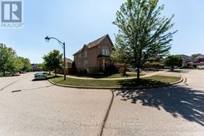 Pickering (Brock Ridge) apartment for rent - A house with a tree in front of it.