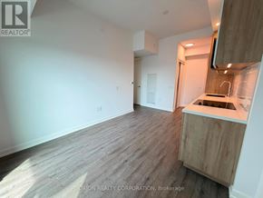 Vaughan (Vaughan Corporate Centre) condo for rent - A kitchen area with a sink and a countertop.