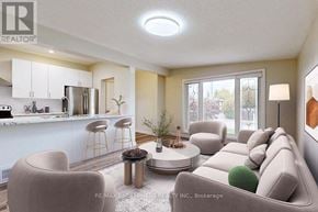 Hamilton (Lawfield) apartment for rent - A living room with a grey couch, a round table, and a bar area.