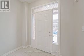 Hamilton (Stoney Creek Mountain) townhouse for rent - A white door in a room with white walls.