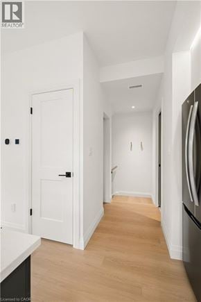 Kitchener apartment for rent - A white door is on the left side of the image.