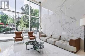 Toronto (Church-Yonge Corridor) condo for rent - A living room with a marble wall and a glass door.