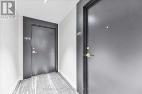 Toronto (Church-Yonge Corridor) condo for rent - A hallway with two doors, one of which is numbered 1815.