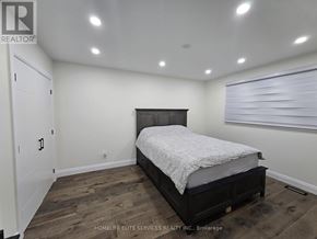 Toronto (Agincourt South-Malvern West) apartment for rent - A bedroom with a bed, dresser, and closet.