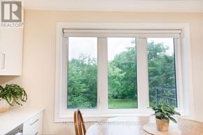 St. Catharines (Western Hill) apartment for rent - A realtor specialist brokerage photo of a kitchen with a window seat.