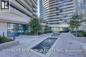 Toronto (Waterfront Communities) condo for rent - A brokerage office for Homelife New World Realty Inc. is shown in the image.