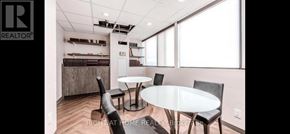 Toronto (Westminster-Branson) condo for rent - A dining room with a table and chairs.