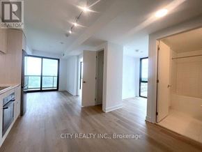 Mississauga (Cooksville) condo for rent - A spacious room with wooden flooring and white walls, part of a property for brokerage by City Realty INC.