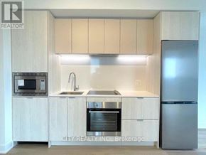 Mississauga (Cooksville) condo for rent - A kitchen with a sink, stove, and refrigerator.