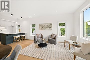 Kitchener apartment for rent - A living room with a grey couch and a coffee table.