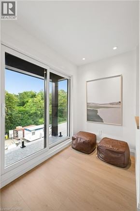 Kitchener apartment for rent - A room with a large window and a painting on the wall.