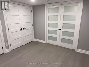 Oshawa (Donevan) apartment for rent - A white door with glass panels is closed.
