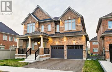 Georgina (Keswick South) apartment for rent - A large, two-story house with a brick facade and a garage is for sale.