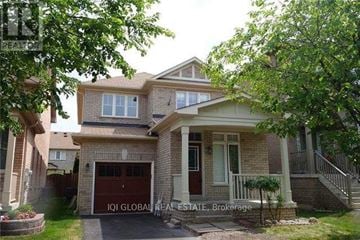 Markham (Greensborough) apartment for rent - A house with a garage and a driveway is for sale.