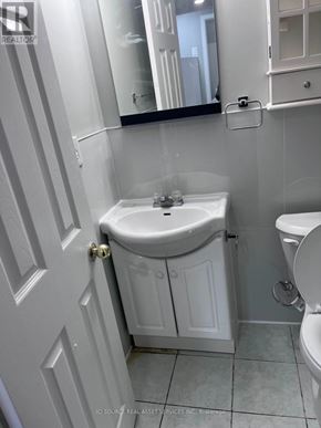 Mississauga (Churchill Meadows) townhouse for rent - A white bathroom with a sink and toilet.