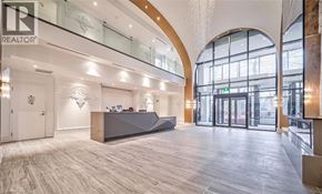 Markham condo for rent - A realtor's office with a reception desk and a large window.