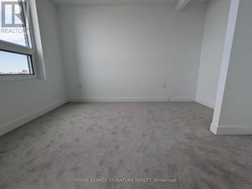 Toronto (Humber Heights) condo for rent - A room with carpeted floor and a window.