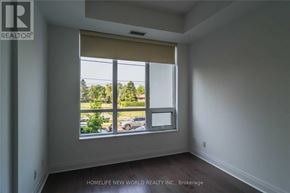 Toronto (Willowdale East) condo for rent - A room with a large window showing a parking lot outside.