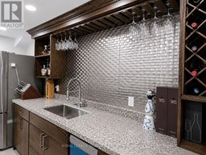 Toronto (Willowdale West) apartment for rent - A kitchen with a sink and a refrigerator.