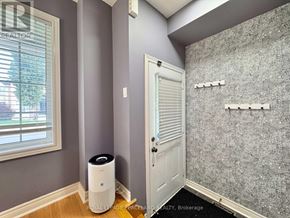 Markham (Cornell) townhouse for rent - A bathroom with a tiled shower wall and a window.