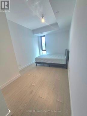 Toronto (Edenbridge-Humber Valley) condo for rent - A bedroom with a bed and a window.