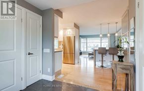 Georgina (Keswick South) apartment for rent - A realtor photo of a home interior with a kitchen in the background.