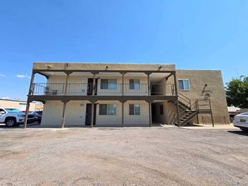 Las Cruces apartment for rent - A two-story building with a balcony on the second floor.