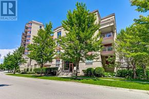 Toronto (Bayview Village) condo for rent - A building with a sign that says REALTOR in the top left corner.