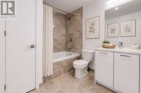 Toronto (Moss Park) condo for rent - A bathroom with a toilet, sink, and shower.