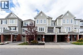 Cambridge townhouse for rent - A large, multi-story residential building with a realtor logo in the corner.