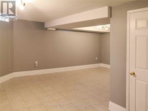 Mississauga (Lisgar) apartment for rent - A room with a white door and a grey wall.