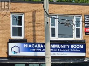 Welland (Welland Downtown) multi-family for rent - A sign for the Niagara Community Room is displayed on a building.