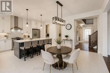 Vaughan (Kleinburg) apartment for rent - A modern kitchen with a dining table and chairs.