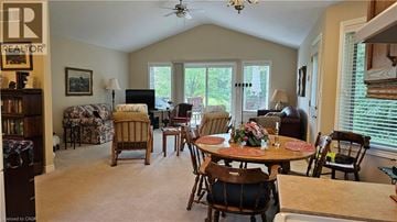 Nanticoke apartment for rent - A living room with a dining table and chairs.