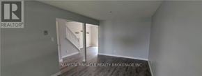 London North (North F) townhouse for rent - A room with a doorway leading to another room.