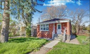 Toronto (West Hill) apartment for rent - A red brick house with a white door and a small porch.