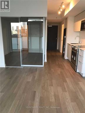 Toronto (Church-Yonge Corridor) condo for rent - A kitchen with a refrigerator, oven, and sink.
