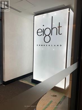 Toronto (Annex) condo for rent - A glass door with the word eight on it.
