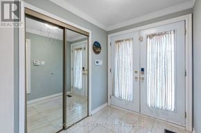 Mississauga (East Credit) apartment for rent - A white door with a glass window is closed.