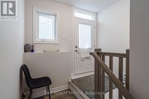Ottawa apartment for rent - A room with a chair and a window.