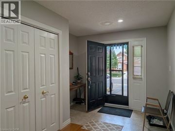 Hamilton apartment for rent - A room with a white door and a black door.