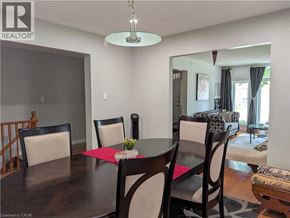 Hamilton apartment for rent - A dining room with a wooden table and chairs.