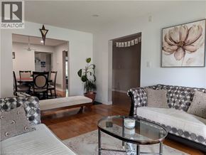 Hamilton apartment for rent - A living room with a couch, a chair, and a coffee table.