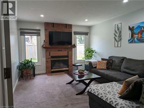 Hamilton apartment for rent - A living room with a fireplace and a couch.