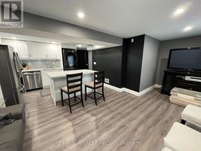 Brampton (Queen Street Corridor) apartment for rent - A modern kitchen with a dining table and chairs.